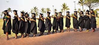 Unisa graduates females in a line outside